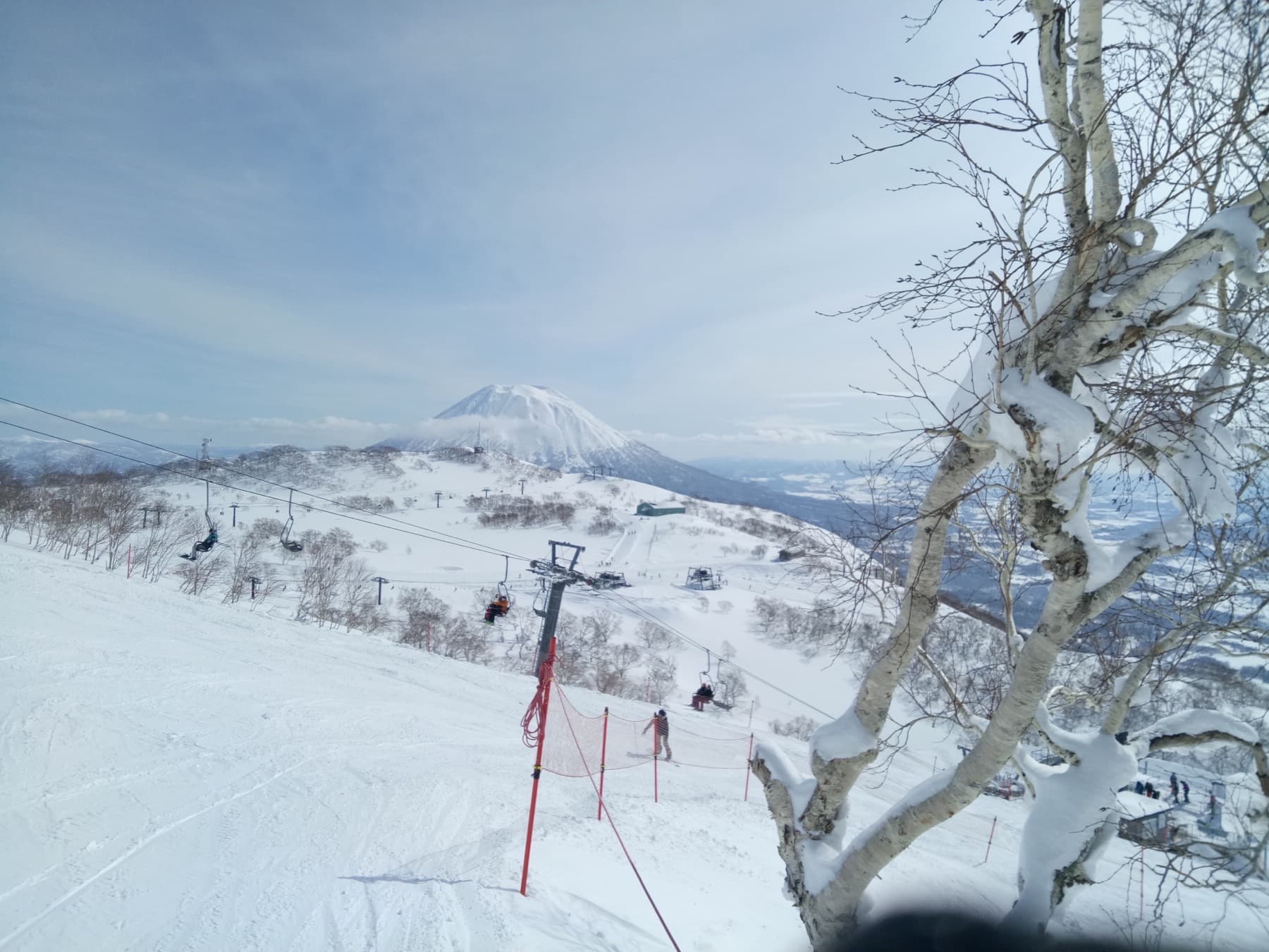 Skiers on a snowy run in Niseko, Hokkaido — Japan Skiing Starts With Hokkaido Powder