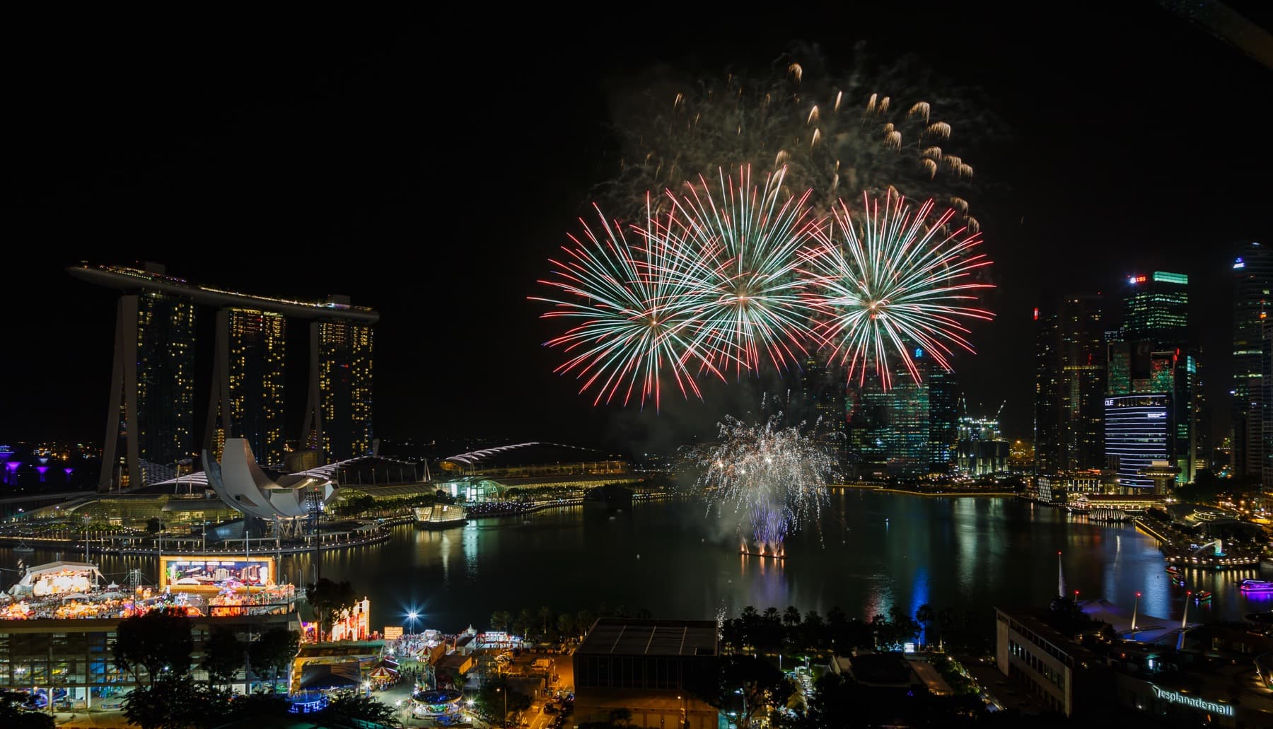 Lunar New Year fireworks over Marina Bay, Singapore — Lunar New Year 2027 Falls on February 6. How Families Can Plan Transpacific Flights Now