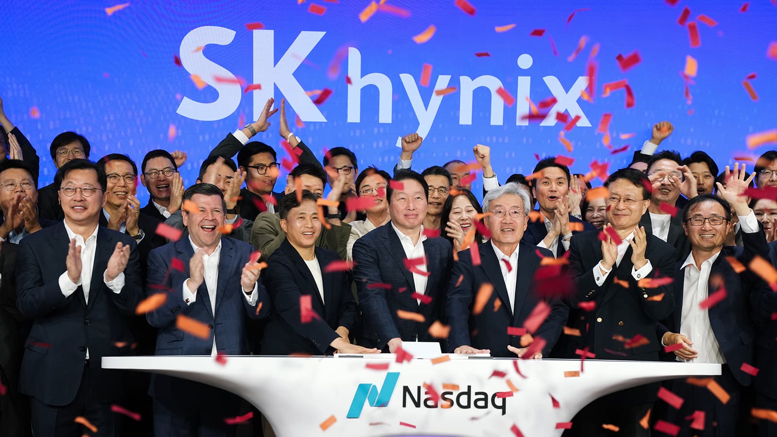 SK hynix executives at the Nasdaq opening bell — Why SK hynix Shares Are So Volatile After Its Nasdaq Debut