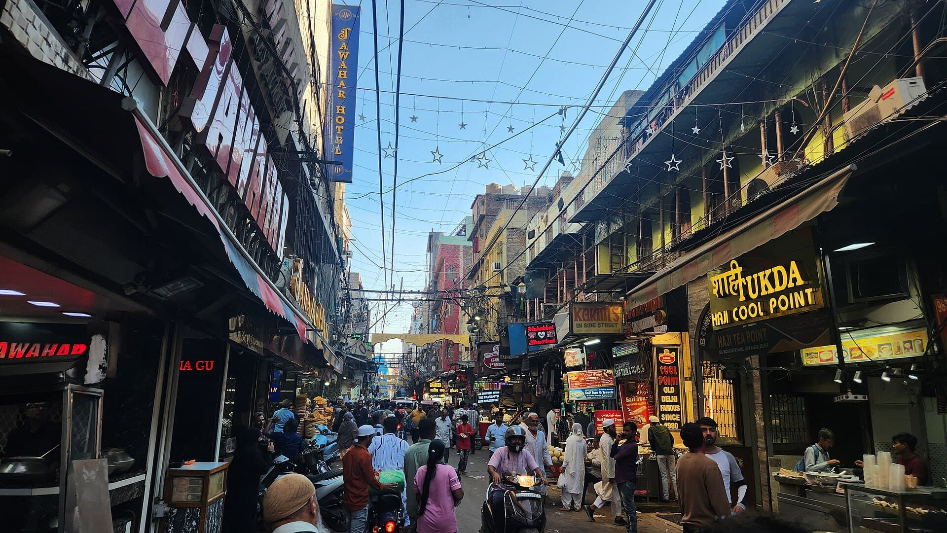 Jama Masjid rising above Old Delhi market streets