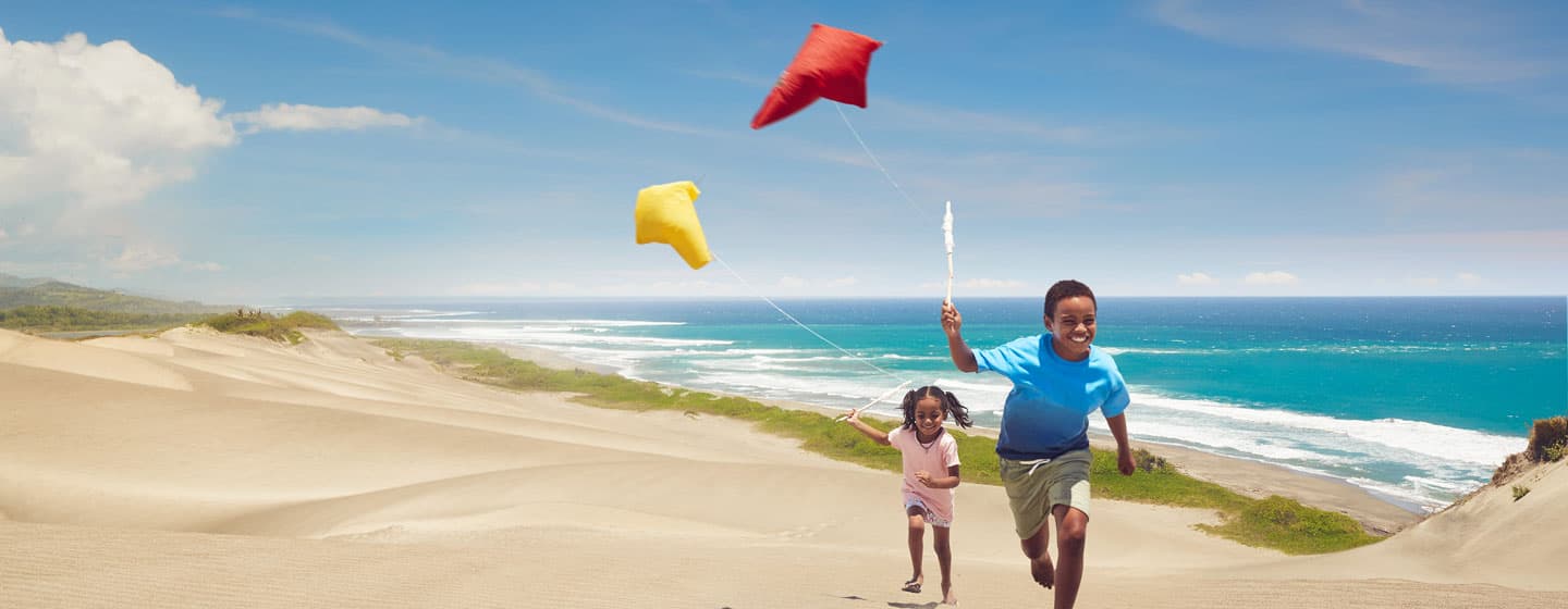 Children flying kites on the Sigatoka Sand Dunes, Viti Levu, Fiji
