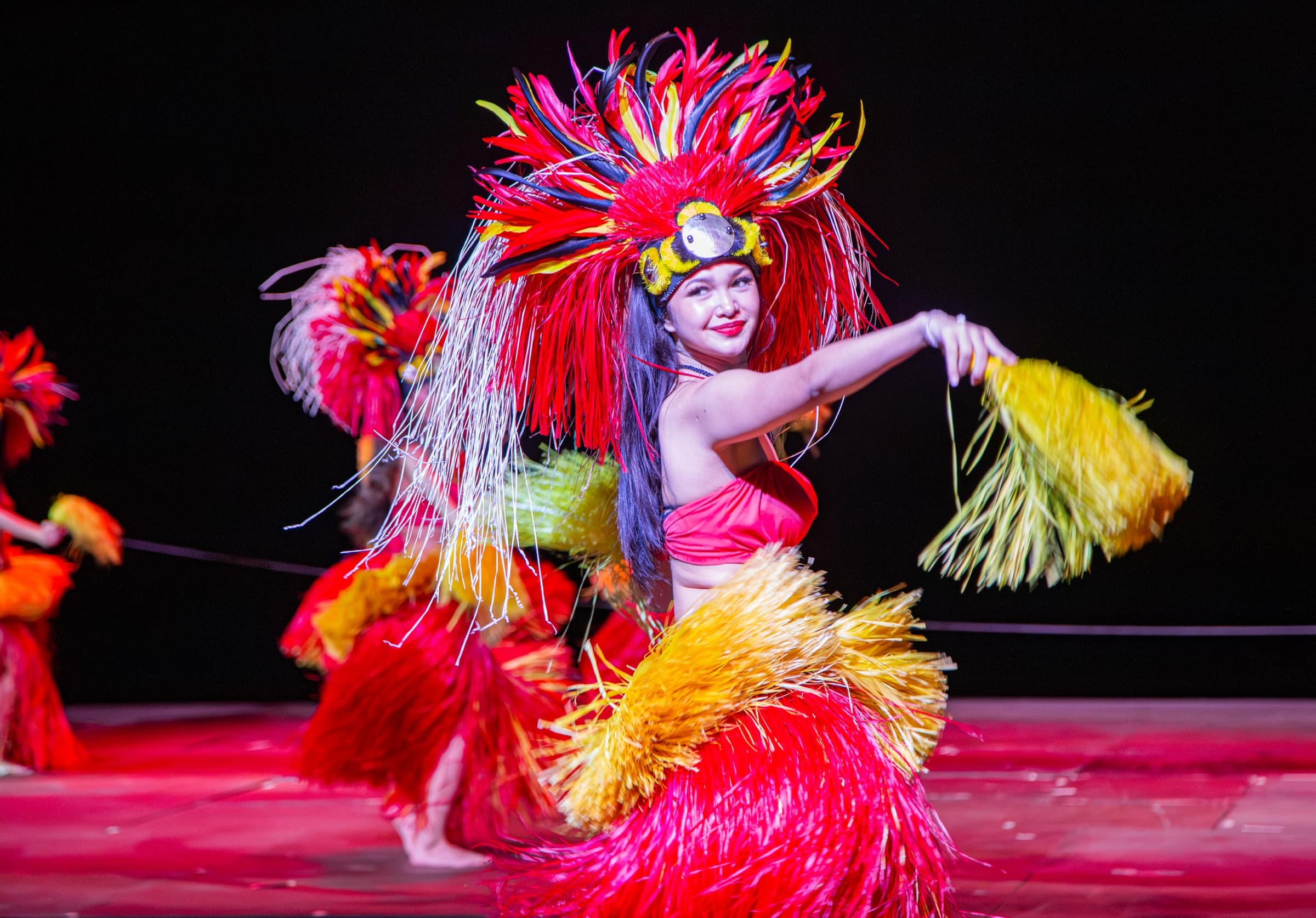 Chamorro dancer performing in traditional costume, Guam