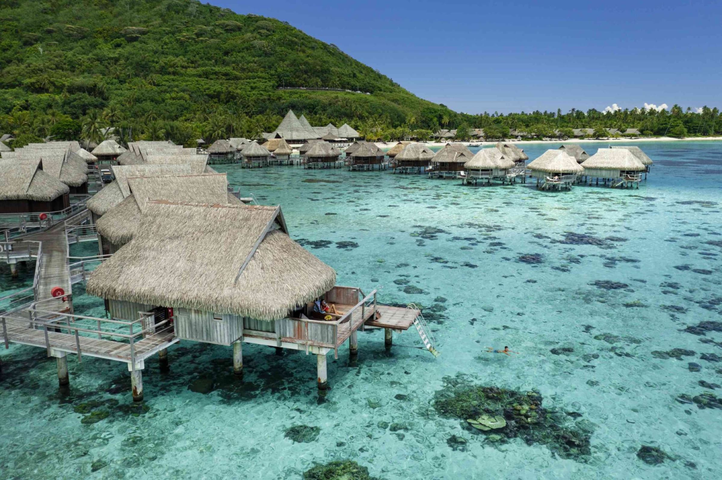 Overwater bungalows on Moorea’s lagoon