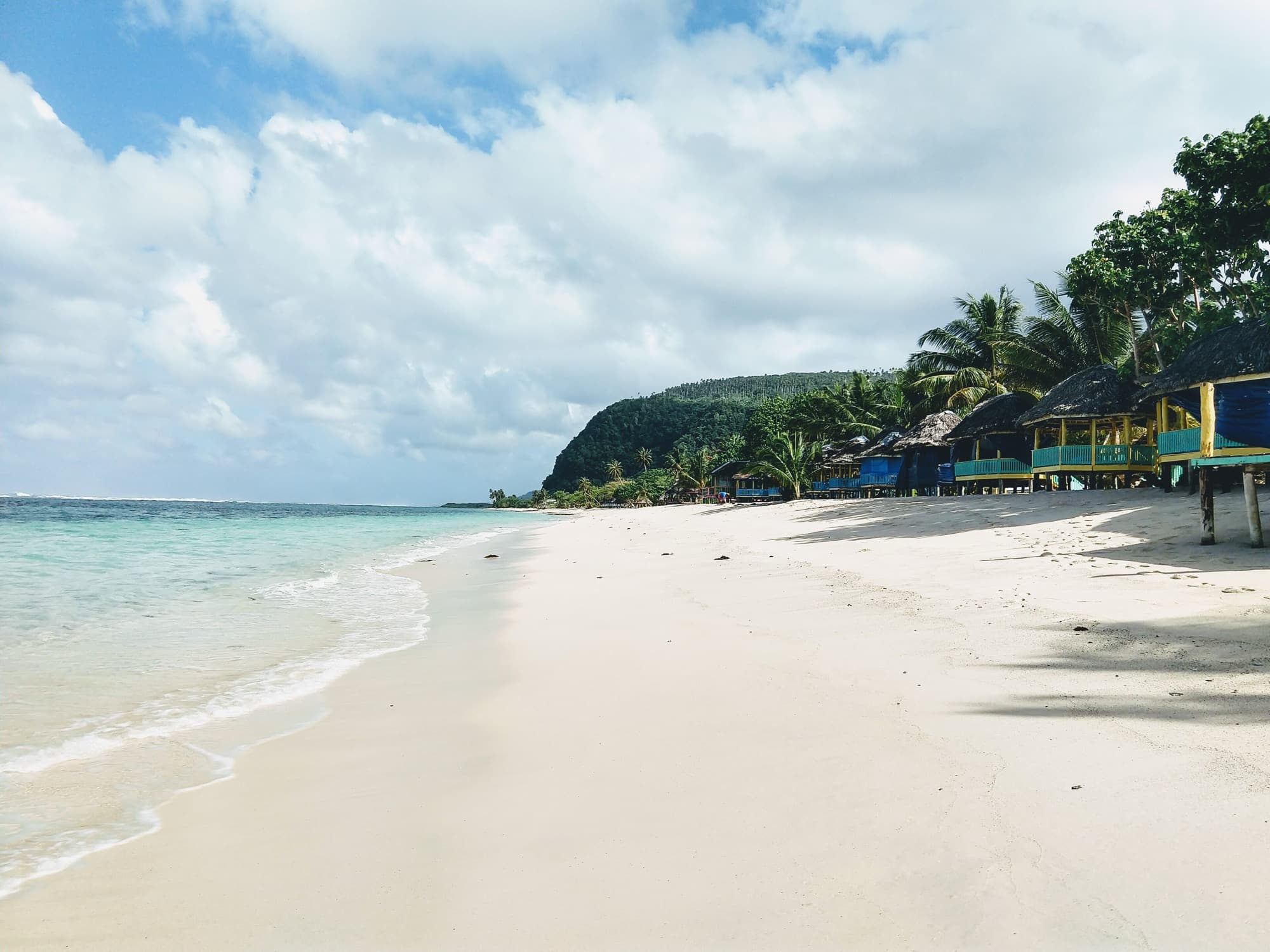 Beach fales along Lalomanu Beach on Upolu, Samoa