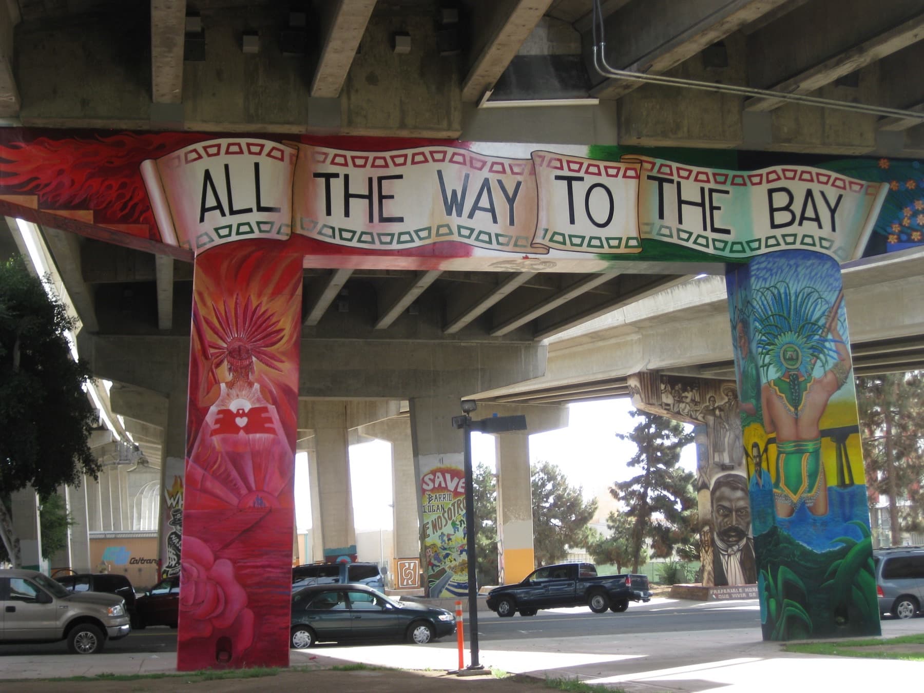 All the Way to the Bay mural on pillars at Chicano Park in Barrio Logan, San Diego