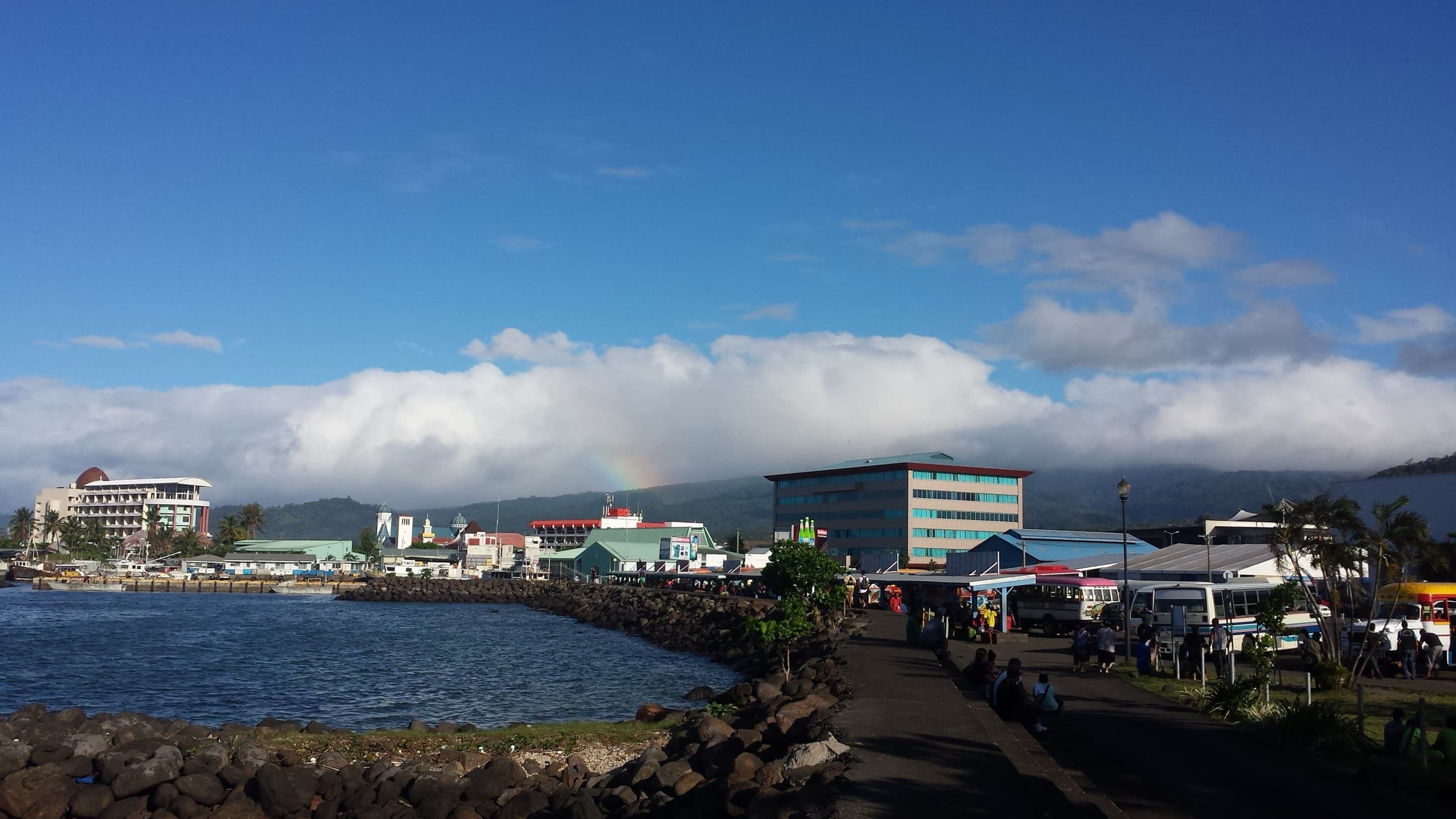 View of Apia, Samoa, with a rainbow over the harbor